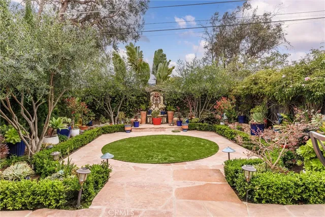 a view of a fountain in the garden