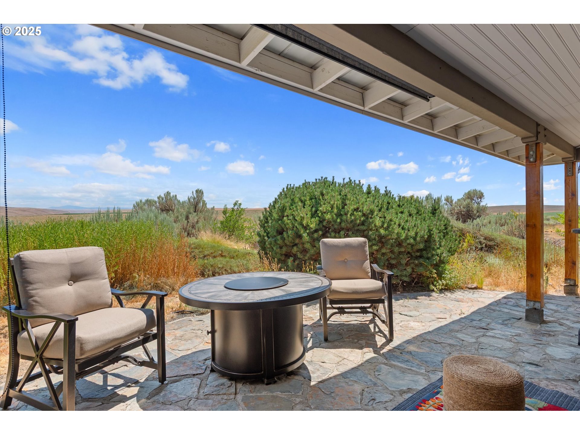 64209 Meadow Brook Road Lexington, OR 97839 - Photo 29 of 48 a view of a chairs and table in the patio