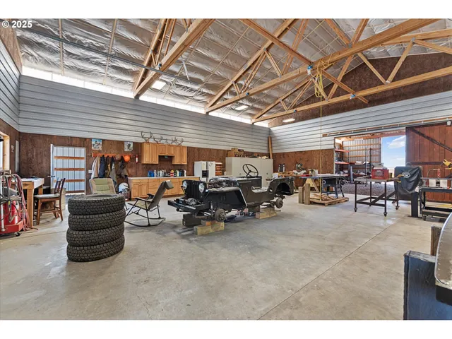 a living room with lots of furniture and a flat screen tv