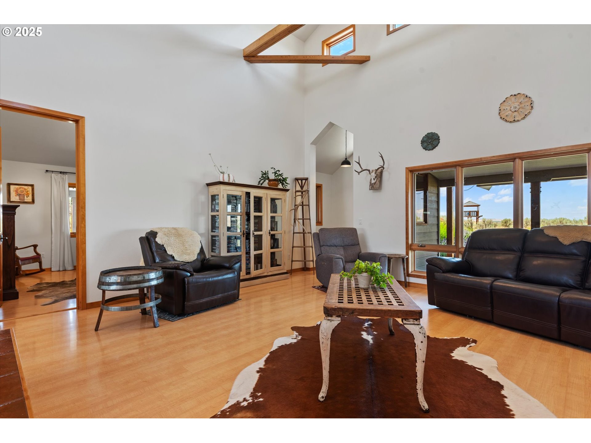 64209 Meadow Brook Road Lexington, OR 97839 - Photo 10 of 48 a living room with furniture and a large window