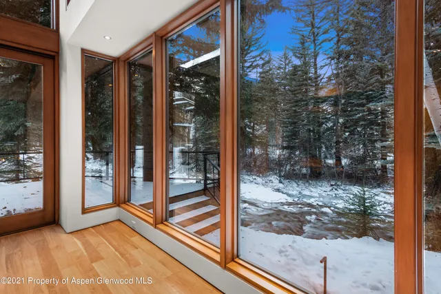 a bedroom with a large bed and a large closet