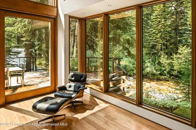 a bathroom with a sink mirror and vanity