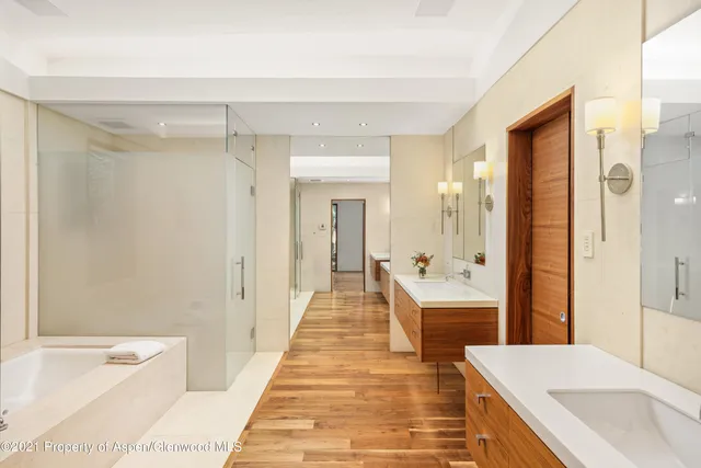 a view of a house with large space and swimming pool