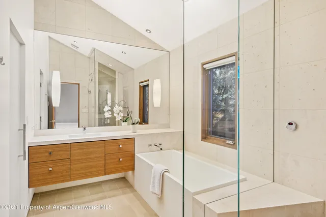 a view of a tree in the middle of a yard