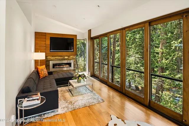 a view of a yard with a tree