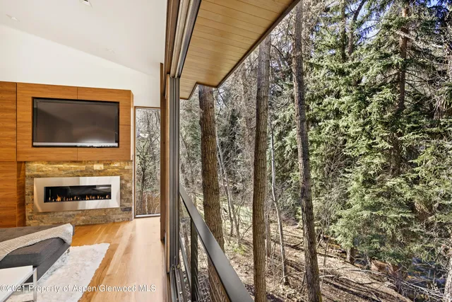 a view of house with backyard outdoor seating and green space
