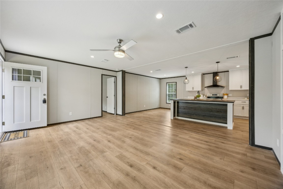 85128 Angie Road Yulee, FL 32097 - Photo 3 of 14 a view of kitchen with wooden floor and electronic appliances