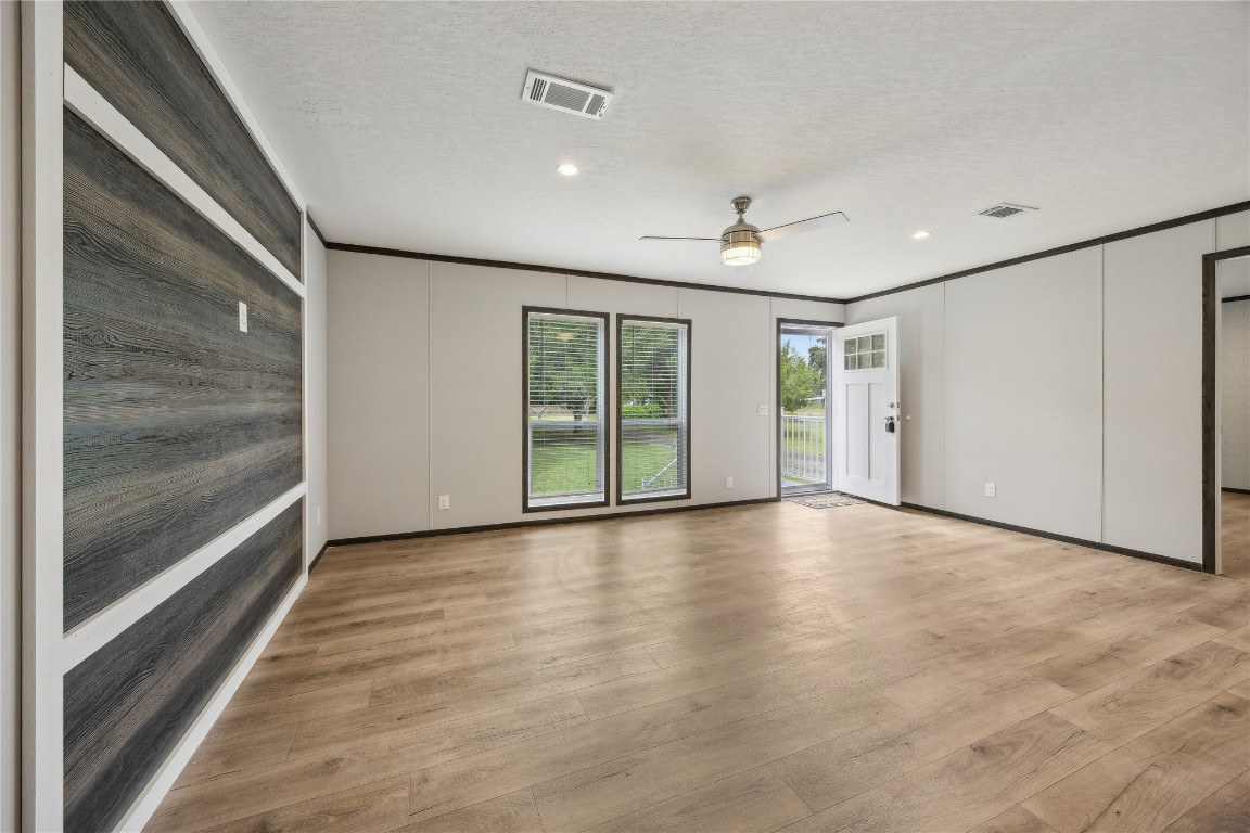 85128 Angie Road Yulee, FL 32097 - Photo 6 of 14 a view of an empty room with glass door