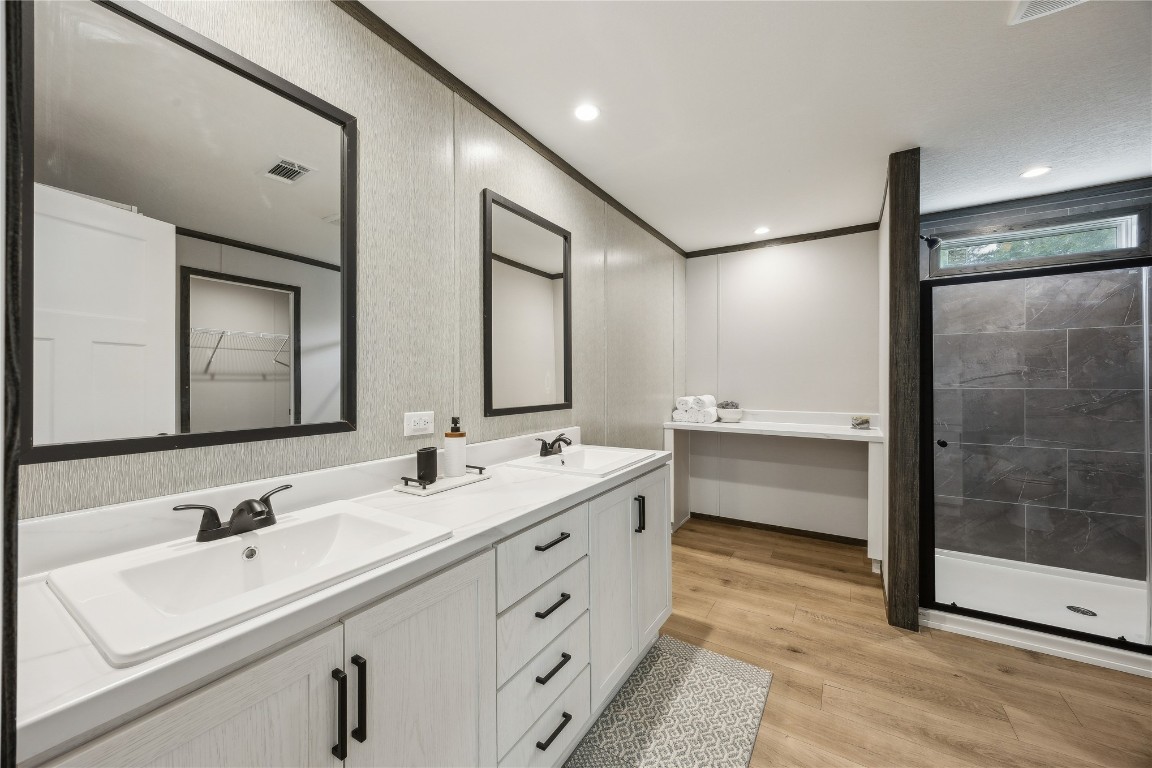 85128 Angie Road Yulee, FL 32097 - Photo 10 of 14 a bathroom with a double vanity sink mirror double and double