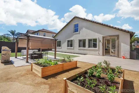 a table and chairs sitting in front of a glass door
