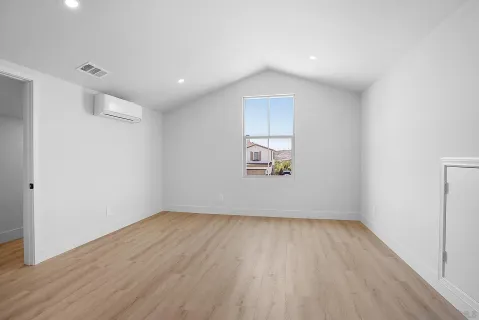 a view of a house next to a yard