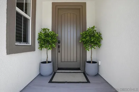 a utility room with cabinets