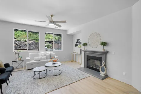 a living room with furniture and a window