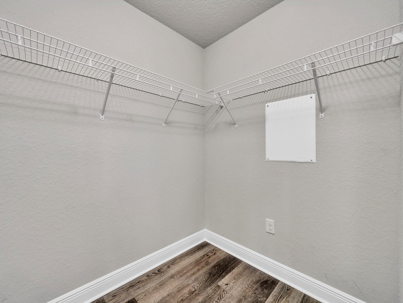 519 Vale Loop Crestview, FL 32536 - Photo 32 of 57 a view of a room with racks on the wall