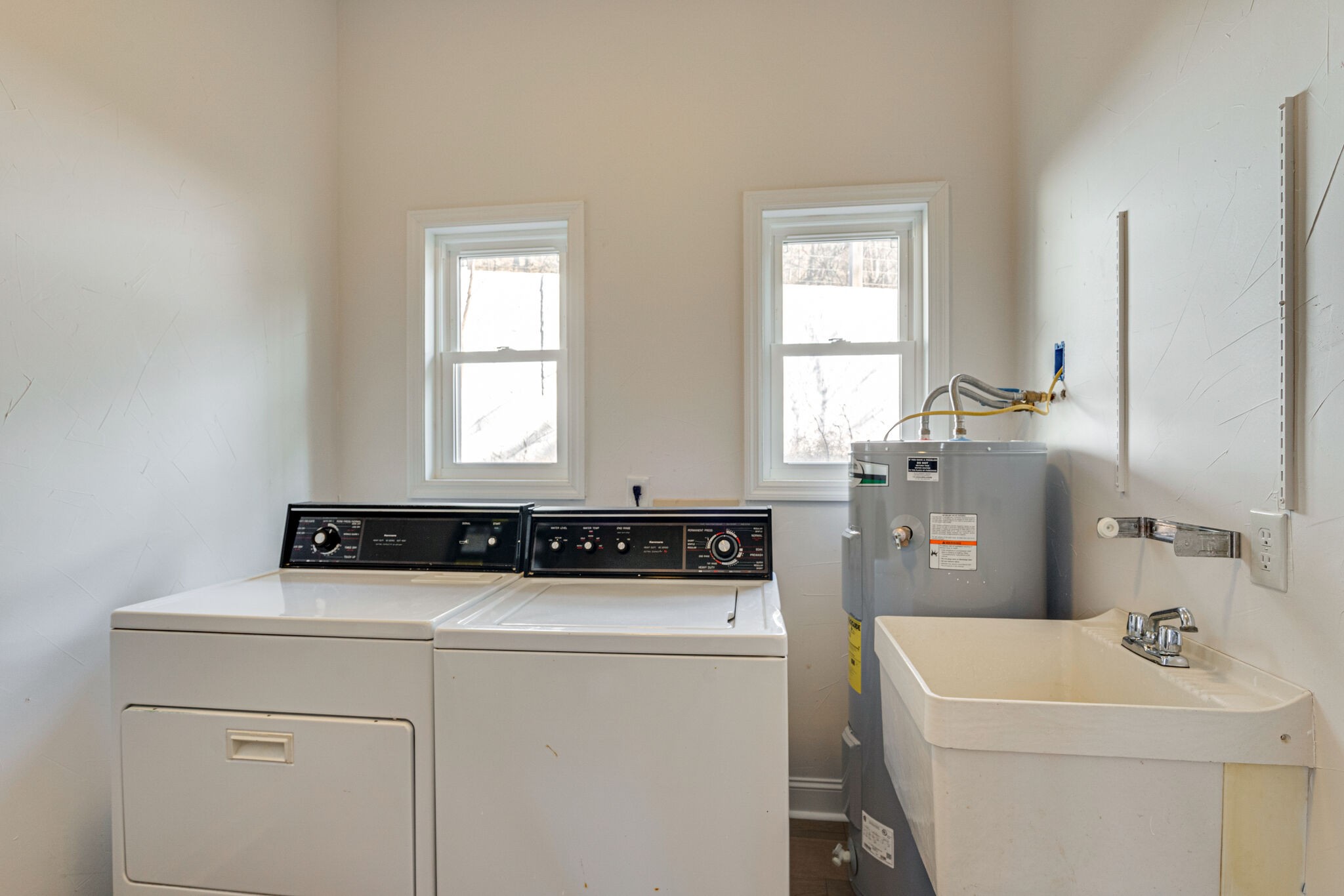 609 Floating Mill Village Road Silver Point, TN 38582 - Photo 29 of 64 a utility room with closet dryer and washer