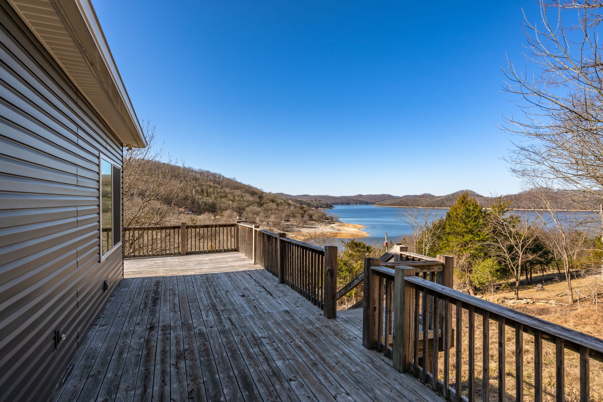 609 Floating Mill Village Road Silver Point, TN 38582 - Photo 33 of 64 a view of a balcony with wooden floor and fence
