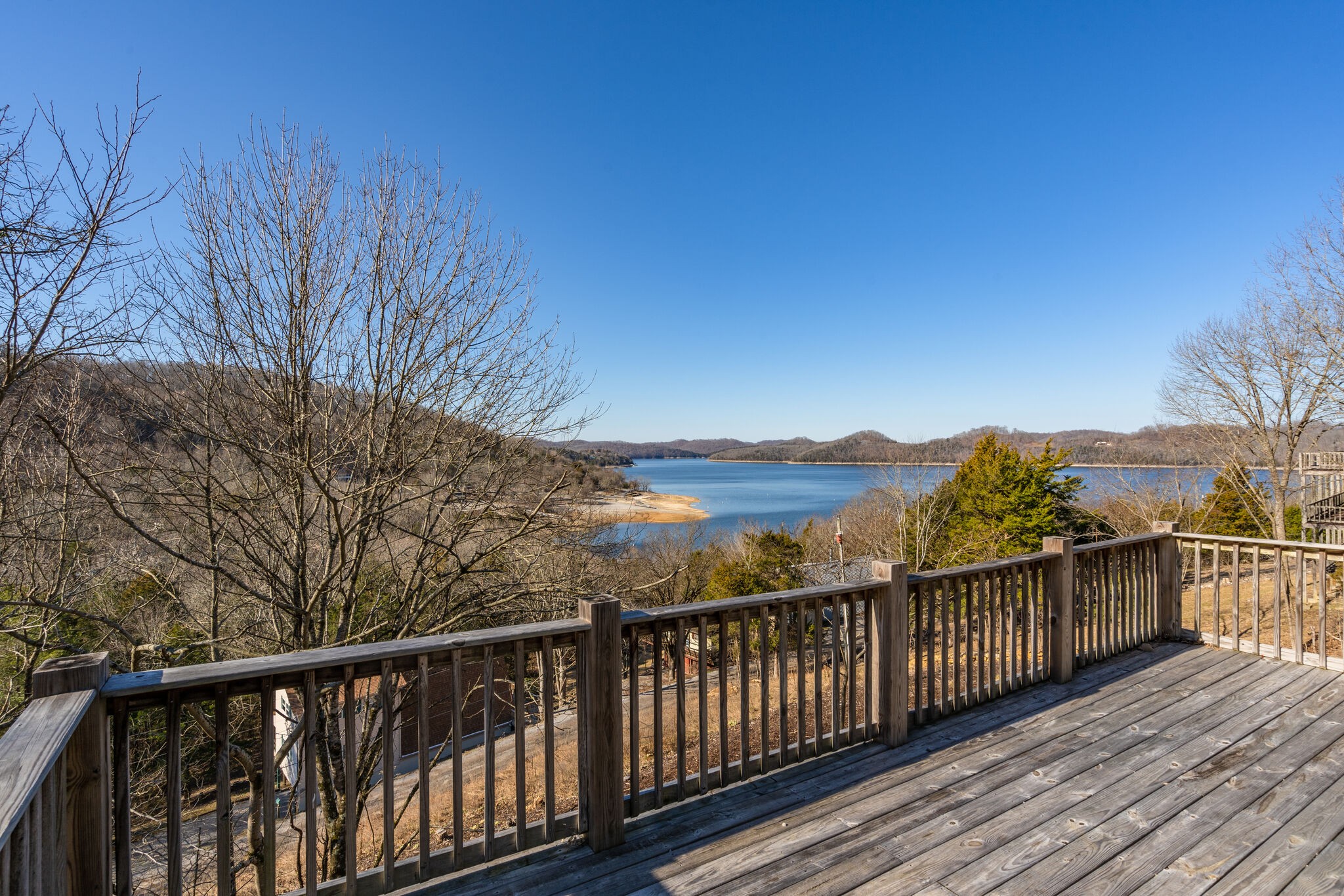 609 Floating Mill Village Road Silver Point, TN 38582 - Photo 34 of 64 a view of a balcony with wooden fence and floor