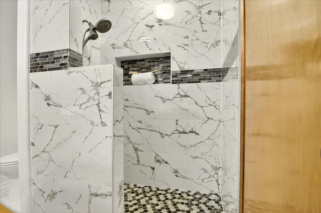 a bathroom with shower