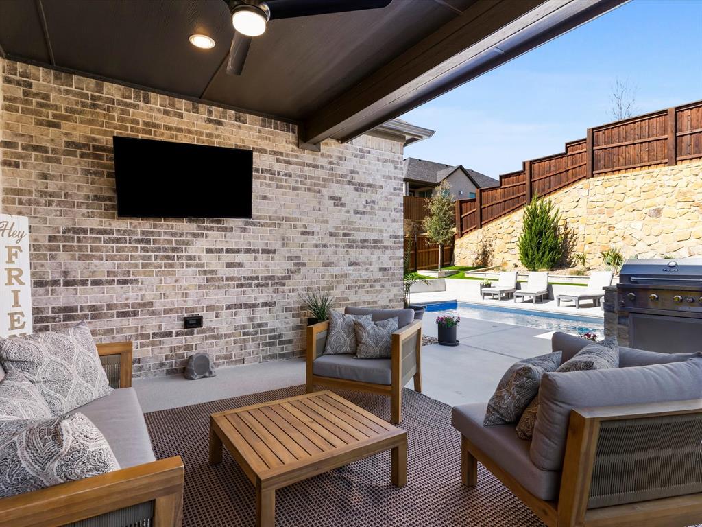 112 Pecan Court Rhome, TX 76078 - Photo 31 of 38 Private backyard space perfect for outdoor entertaining, relaxing evenings, or weekend gatherings.