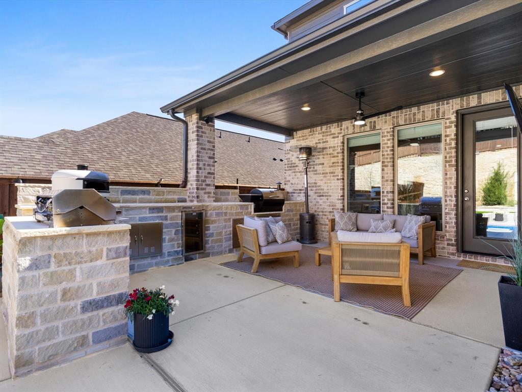 112 Pecan Court Rhome, TX 76078 - Photo 32 of 38 Private backyard space perfect for outdoor entertaining, relaxing evenings, or weekend gatherings.