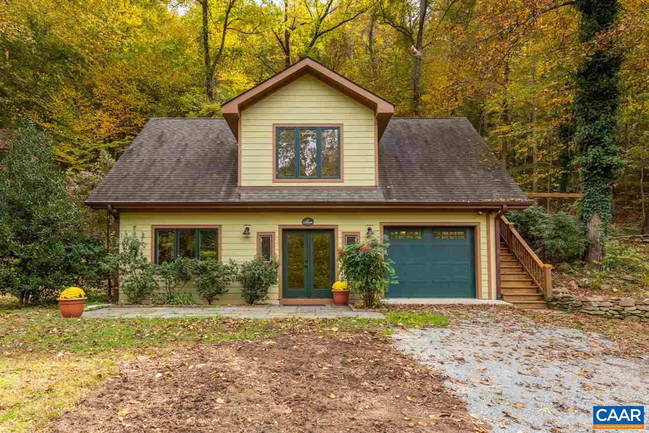 4365 Taylor Creek Road Afton, VA 22920 - Photo 1 of 49 a front view of a house with a yard and garage
