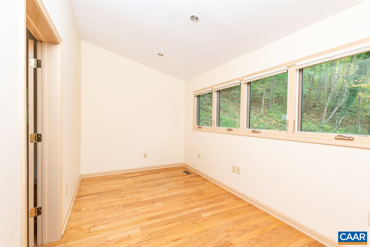 4365 Taylor Creek Road Afton, VA 22920 - Photo 20 of 49 a view of an empty room with a window