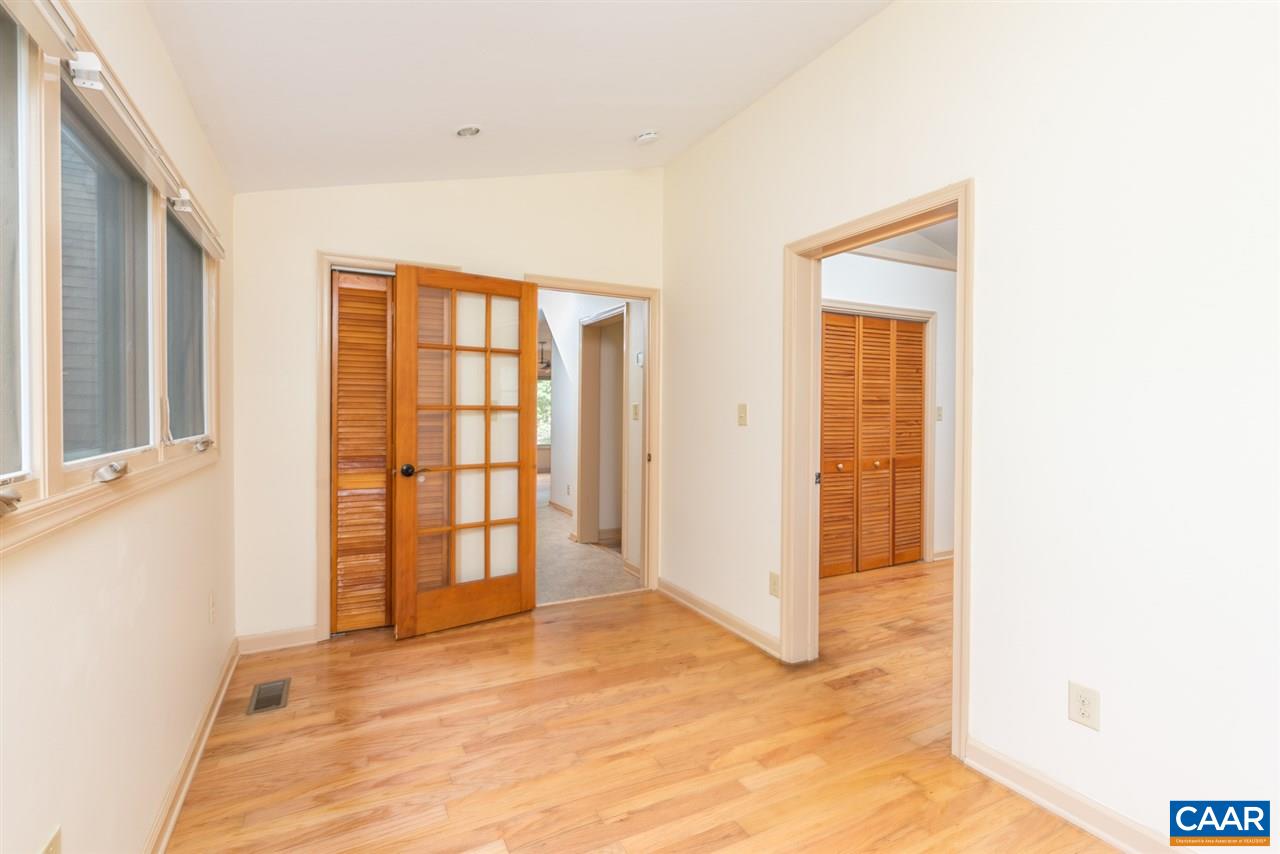 4365 Taylor Creek Road Afton, VA 22920 - Photo 21 of 49 a view of an empty room with glass door