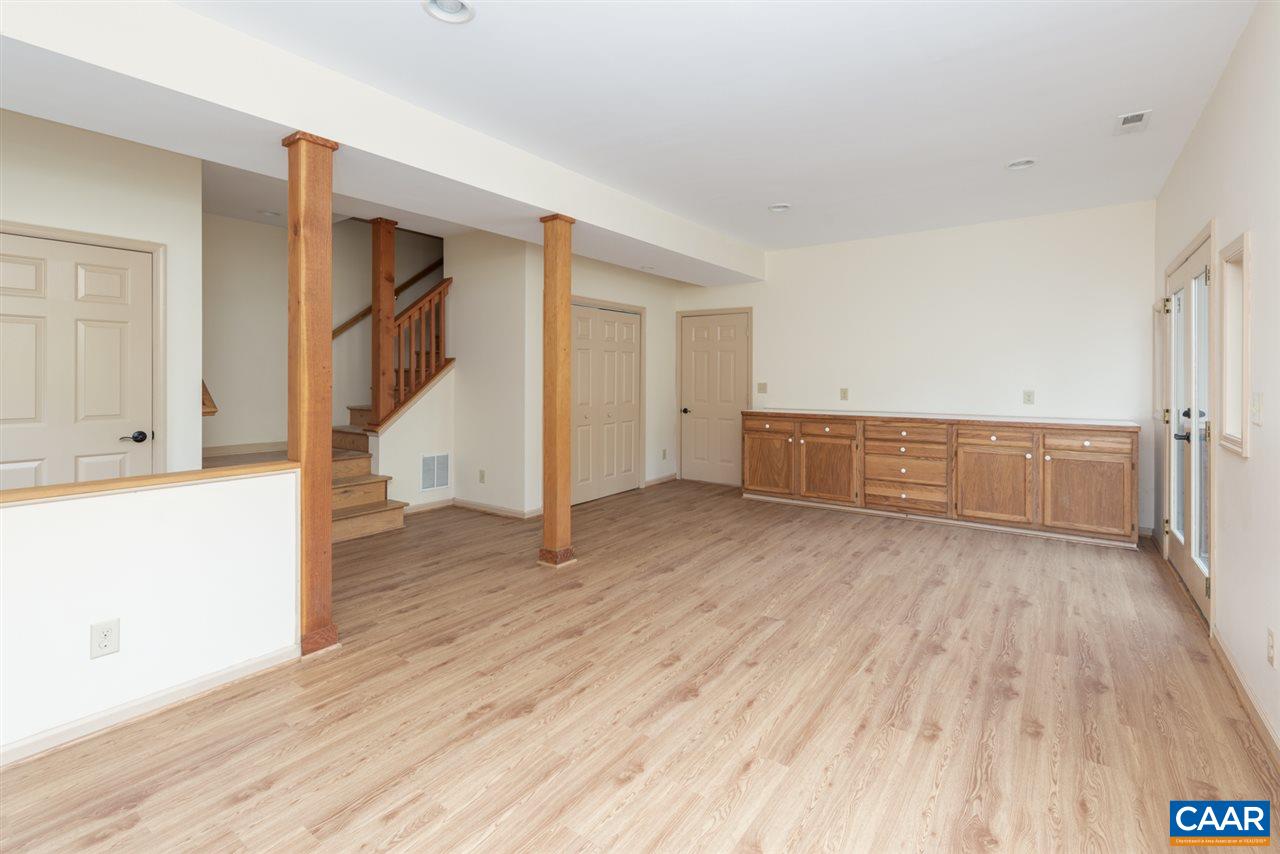 4365 Taylor Creek Road Afton, VA 22920 - Photo 29 of 49 wooden floor in an empty room with a window