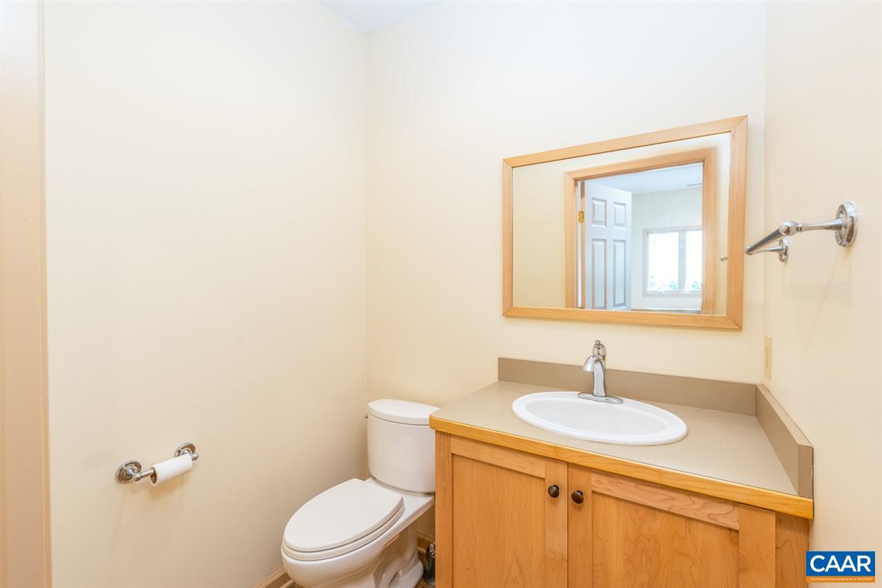 4365 Taylor Creek Road Afton, VA 22920 - Photo 31 of 49 a bathroom with a sink toilet and mirror