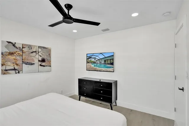 a bathroom with a sink and vanity