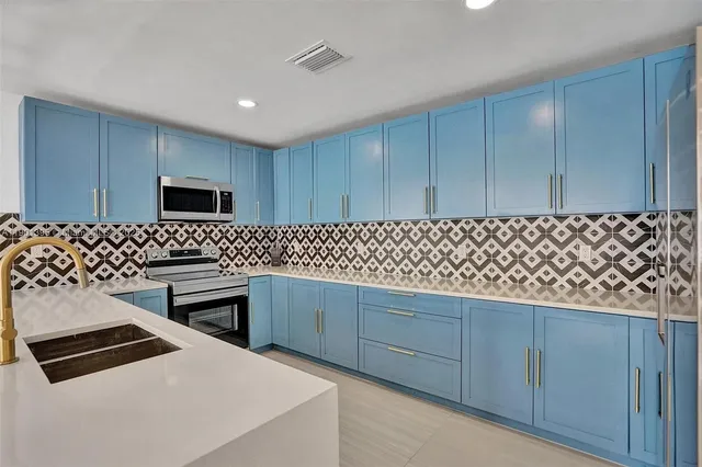 a view of a dining room with furniture and window