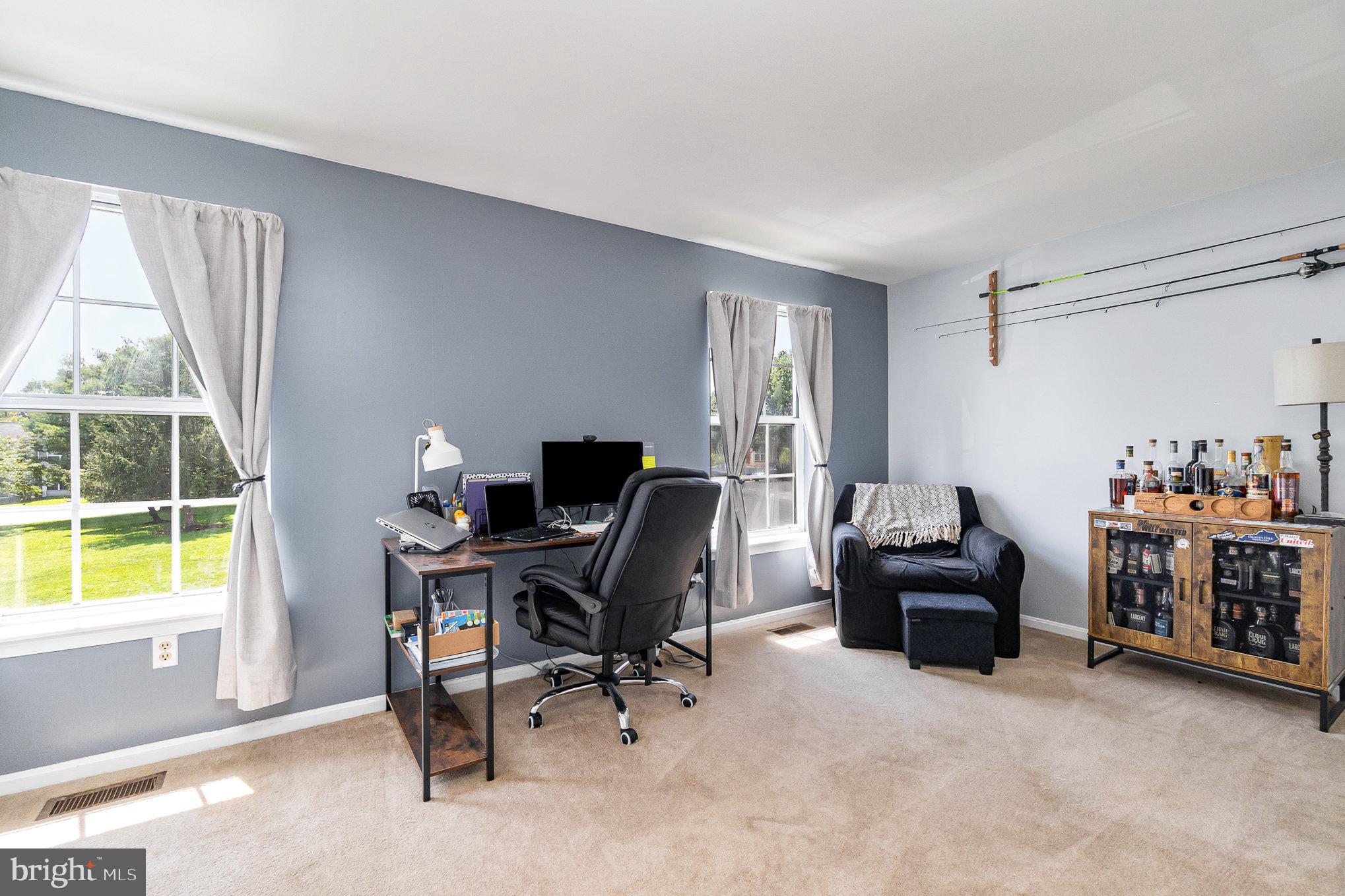 1213 Brice Square Belcamp, MD 21017 - Photo 17 of 23 a view of a workspace with furniture and a window