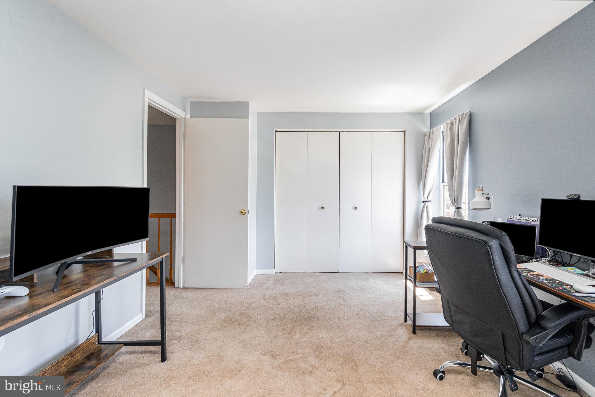 1213 Brice Square Belcamp, MD 21017 - Photo 18 of 23 a view of a workspace with furniture and a flat screen tv