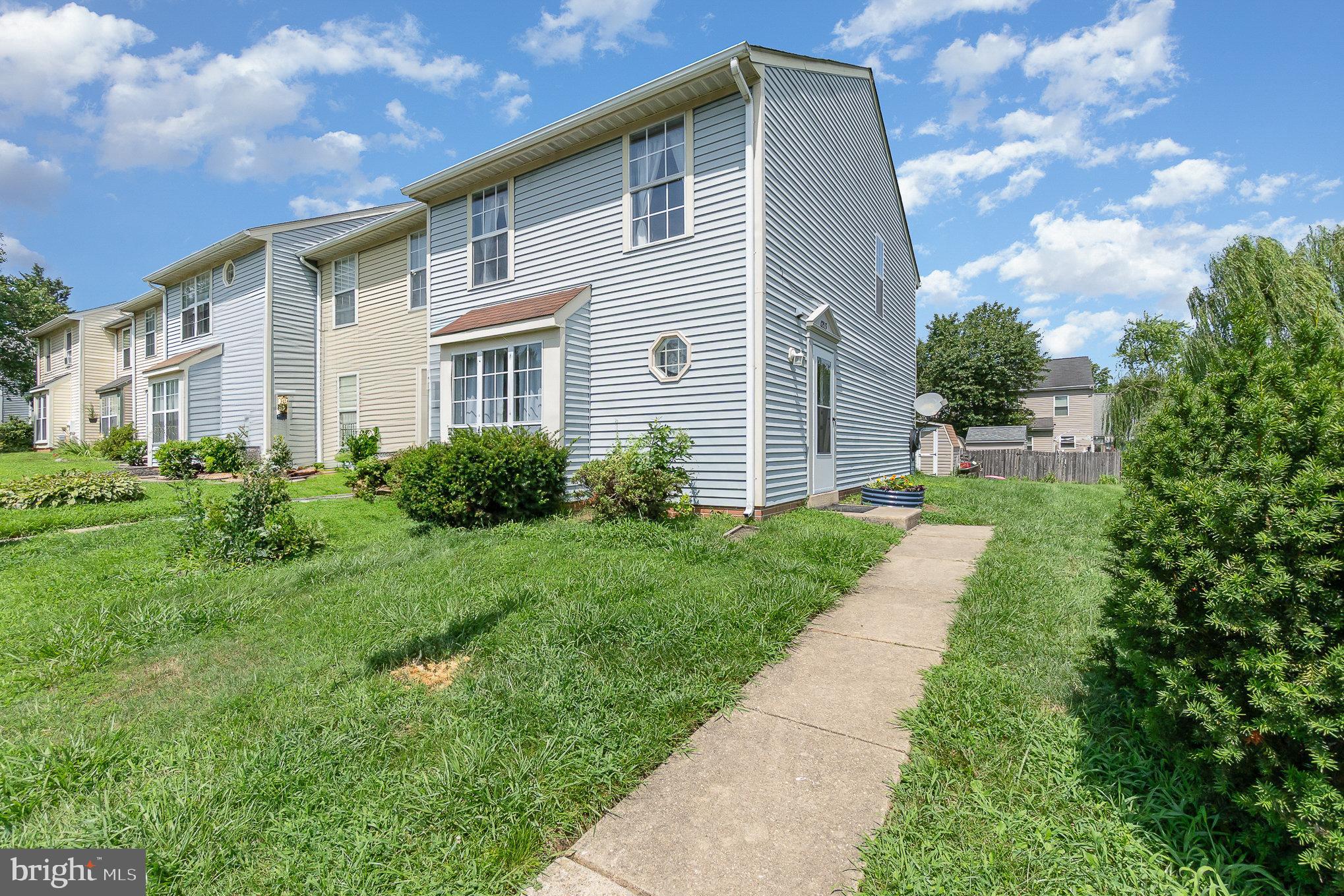 1213 Brice Square Belcamp, MD 21017 - Photo 3 of 23 a front view of a house with garden