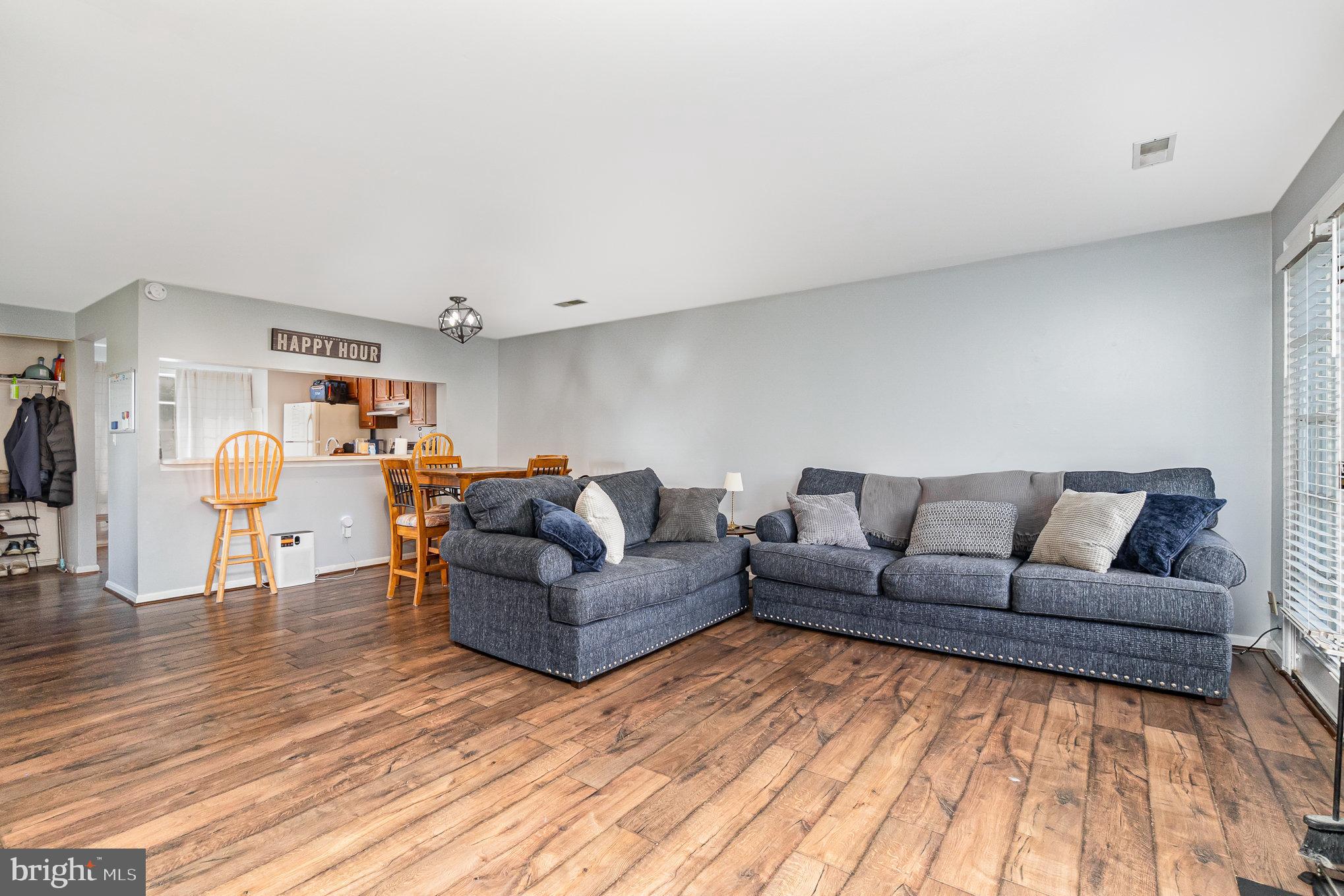 1213 Brice Square Belcamp, MD 21017 - Photo 6 of 23 a living room with furniture and a wooden floor