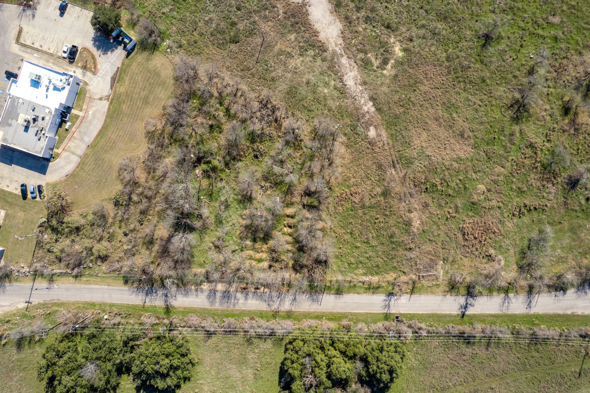 1701 Manchaca Springs Road Buda, TX 78610 - Photo 2 of 3 a view of a lake with outdoor space