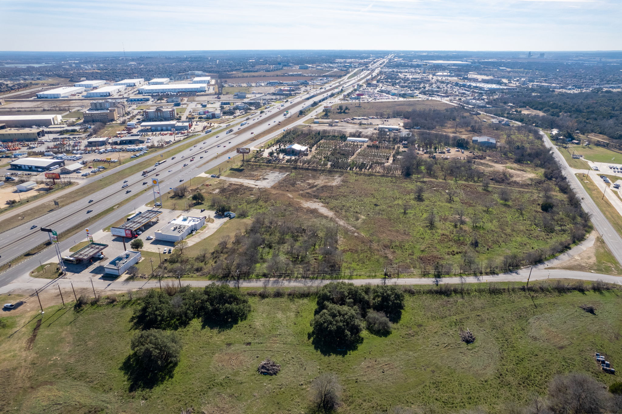 1701 Manchaca Springs Road Buda, TX 78610 - Photo 3 of 3 an aerial view of residential houses with outdoor space