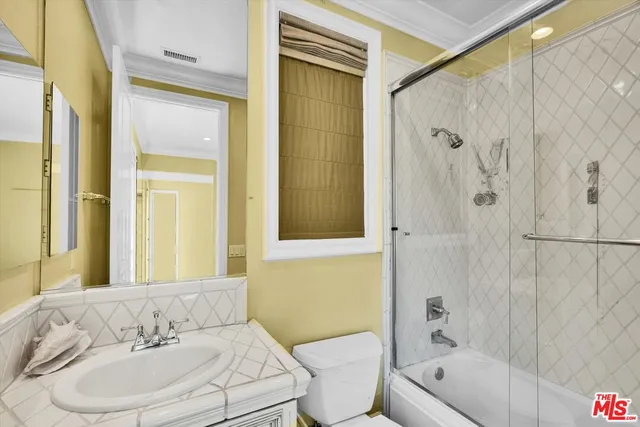 a view of a backyard with pathway