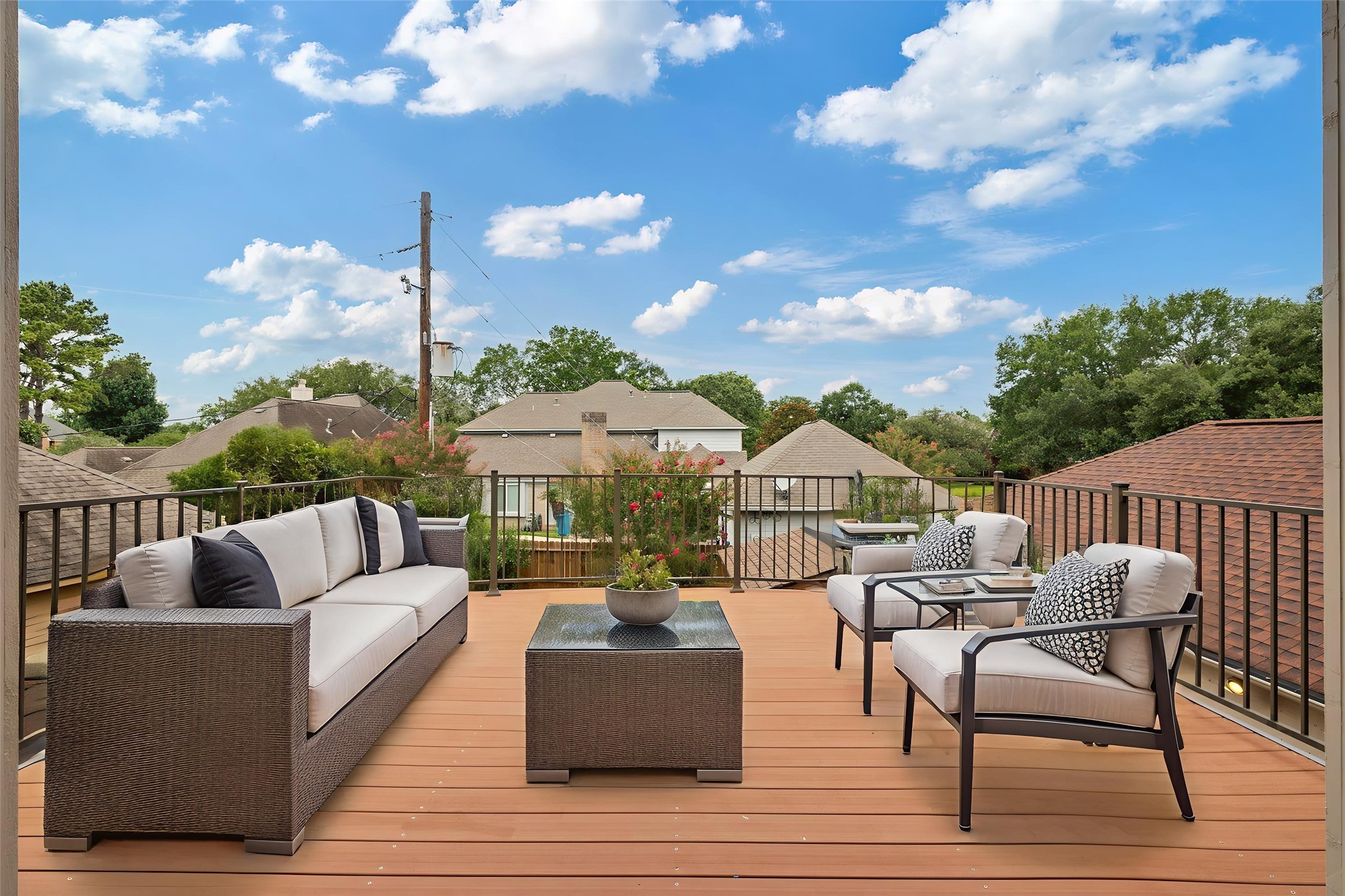 5802 Ashmere Lane Spring, TX 77379 - Photo 12 of 19 a view of a patio with couches potted plants and a patio