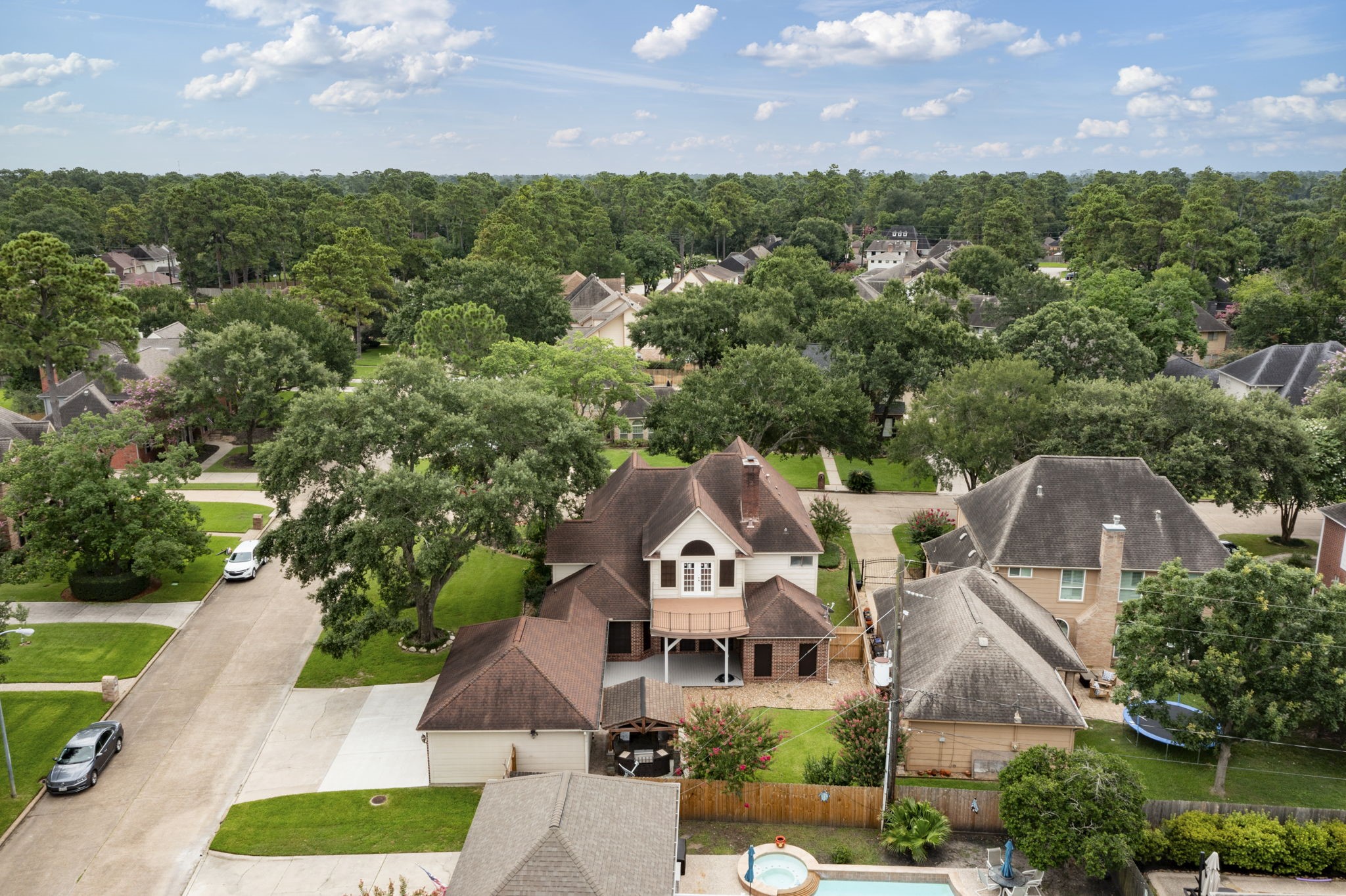 5802 Ashmere Lane Spring, TX 77379 - Photo 18 of 19 an aerial view of multiple houses with a yard