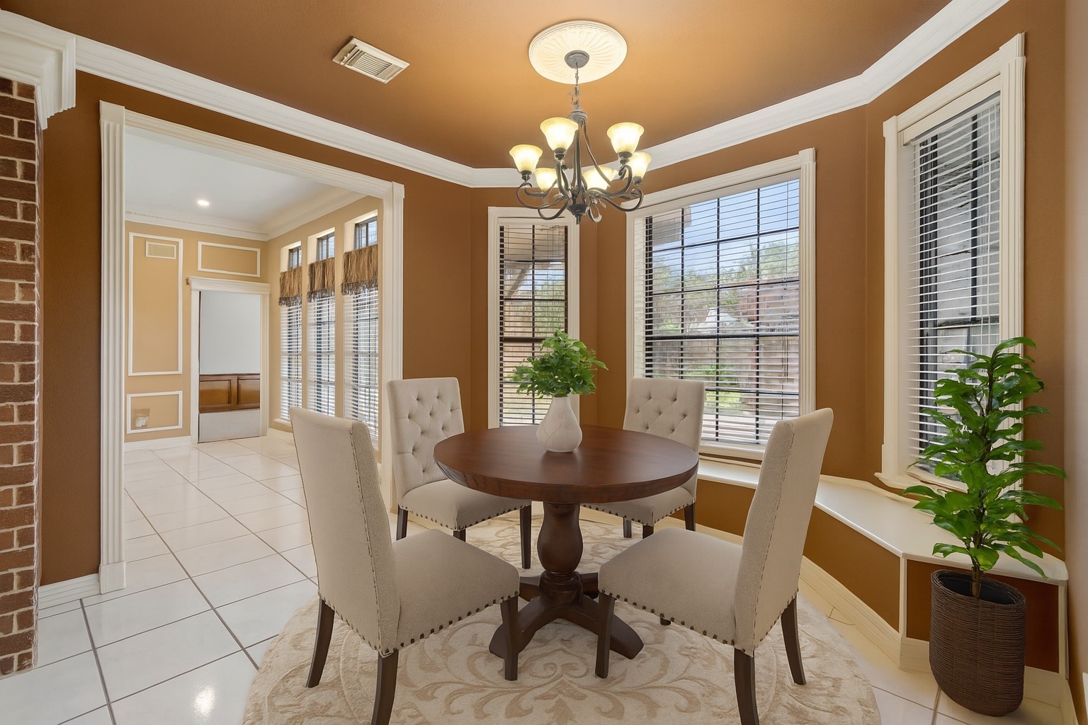 5802 Ashmere Lane Spring, TX 77379 - Photo 6 of 19 a view of a dining room with furniture and chandelier