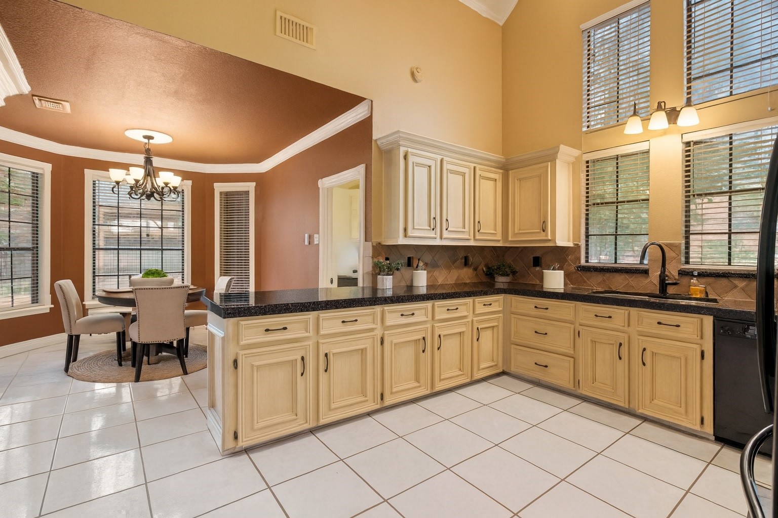 5802 Ashmere Lane Spring, TX 77379 - Photo 7 of 19 a large white kitchen with a large window