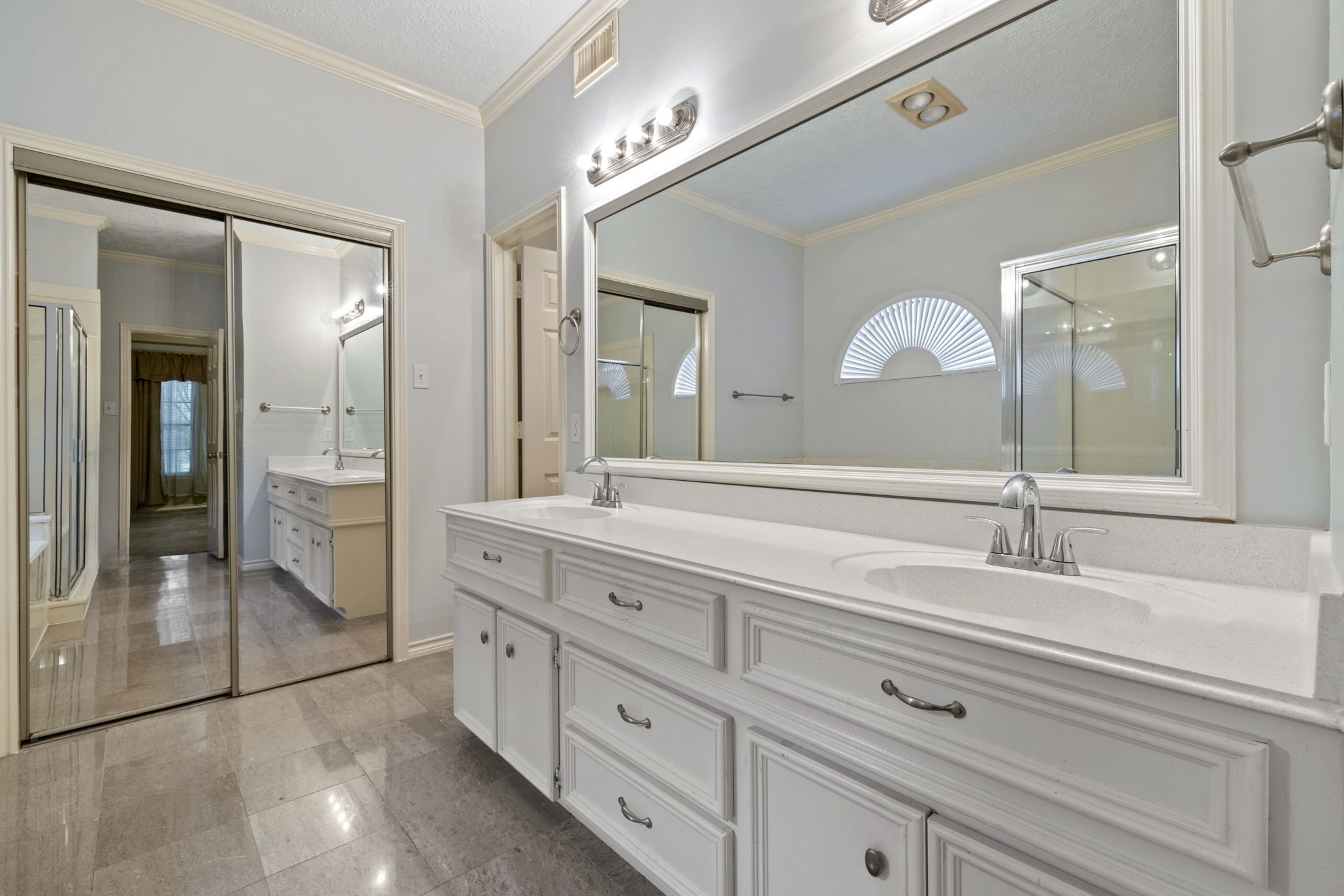 5802 Ashmere Lane Spring, TX 77379 - Photo 10 of 19 a bathroom with a sink and a mirror