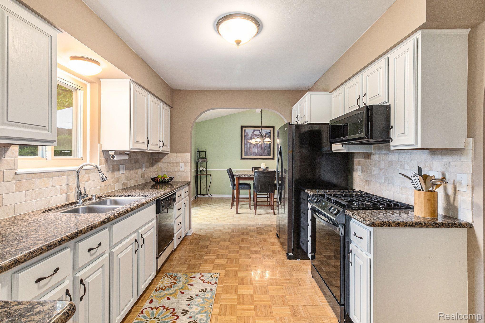 1746 Ridge Road White Lake, MI 48383 - Photo 13 of 39 View from Kitchen into Dining Room