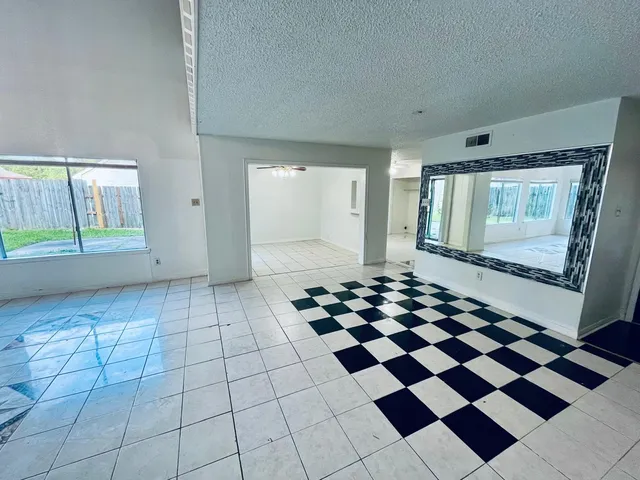 a view of a black and white checkered floor