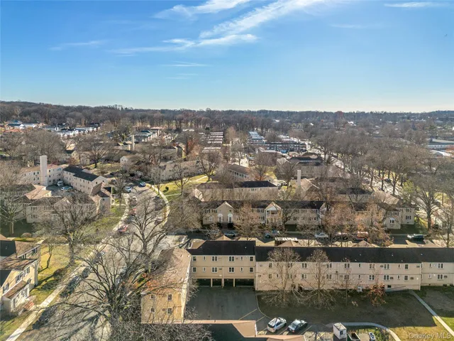 an aerial view of residential building and lake view