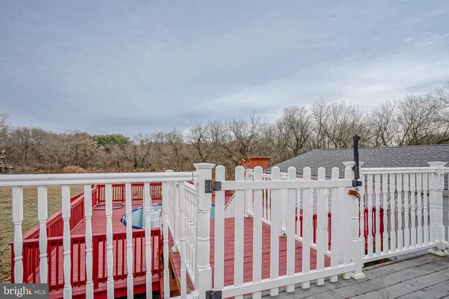 a view of a wooden fence