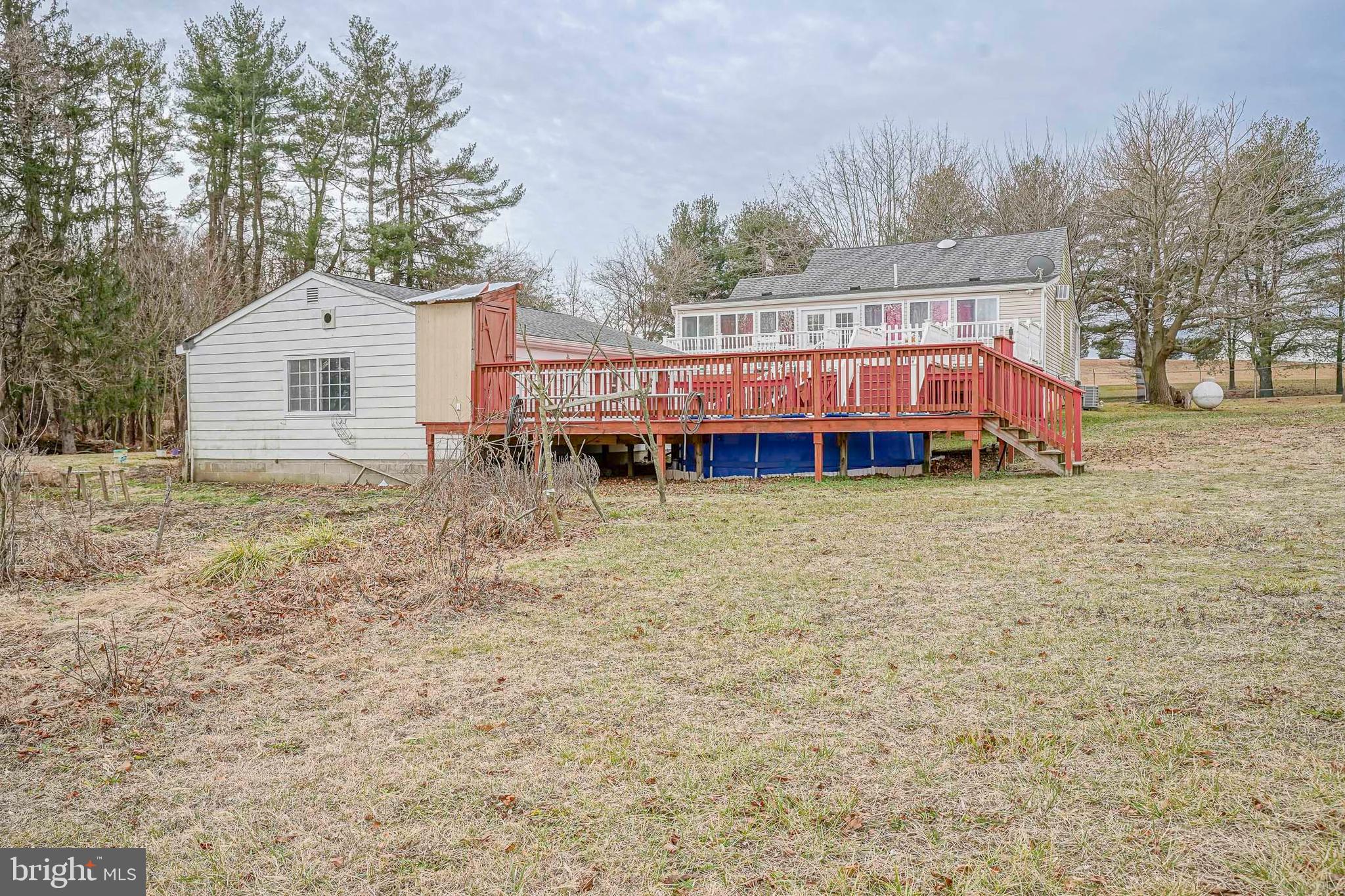 430 Monroeville Road Mullica Hill, NJ 08062 - Photo 31 of 31 a view of a house with a yard and sitting area