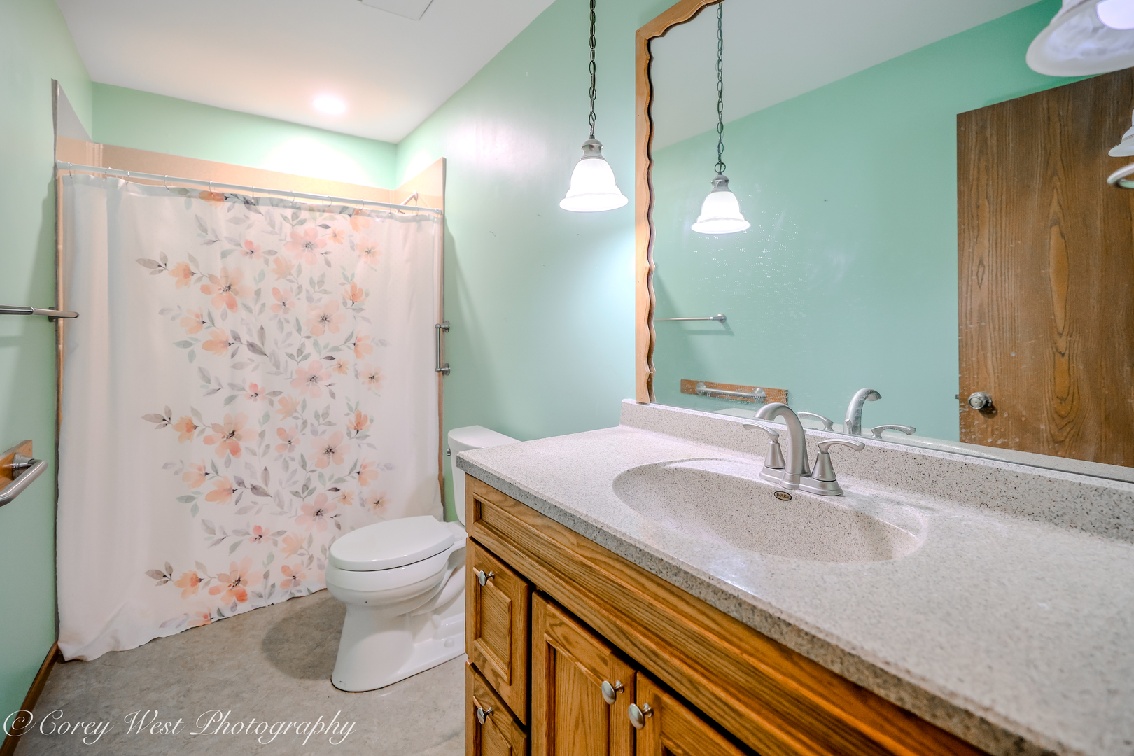 335 South Hadsall Street Genoa, IL 60135 - Photo 15 of 23 a bathroom with a sink toilet and shower