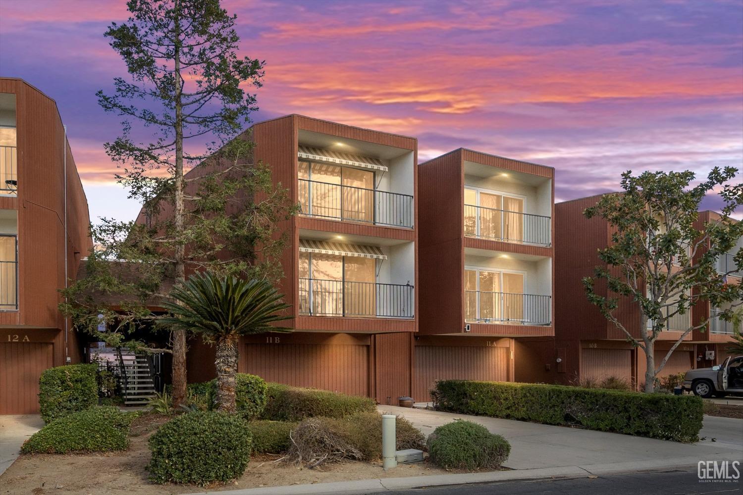 Undisclosed Address Bakersfield, CA 93306 - Photo 1 of 52 a front view of a house with a yard